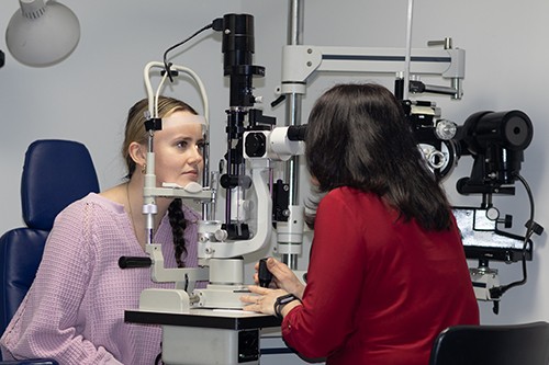 Dr. Segerson with his patient at Kenmore Eye Care