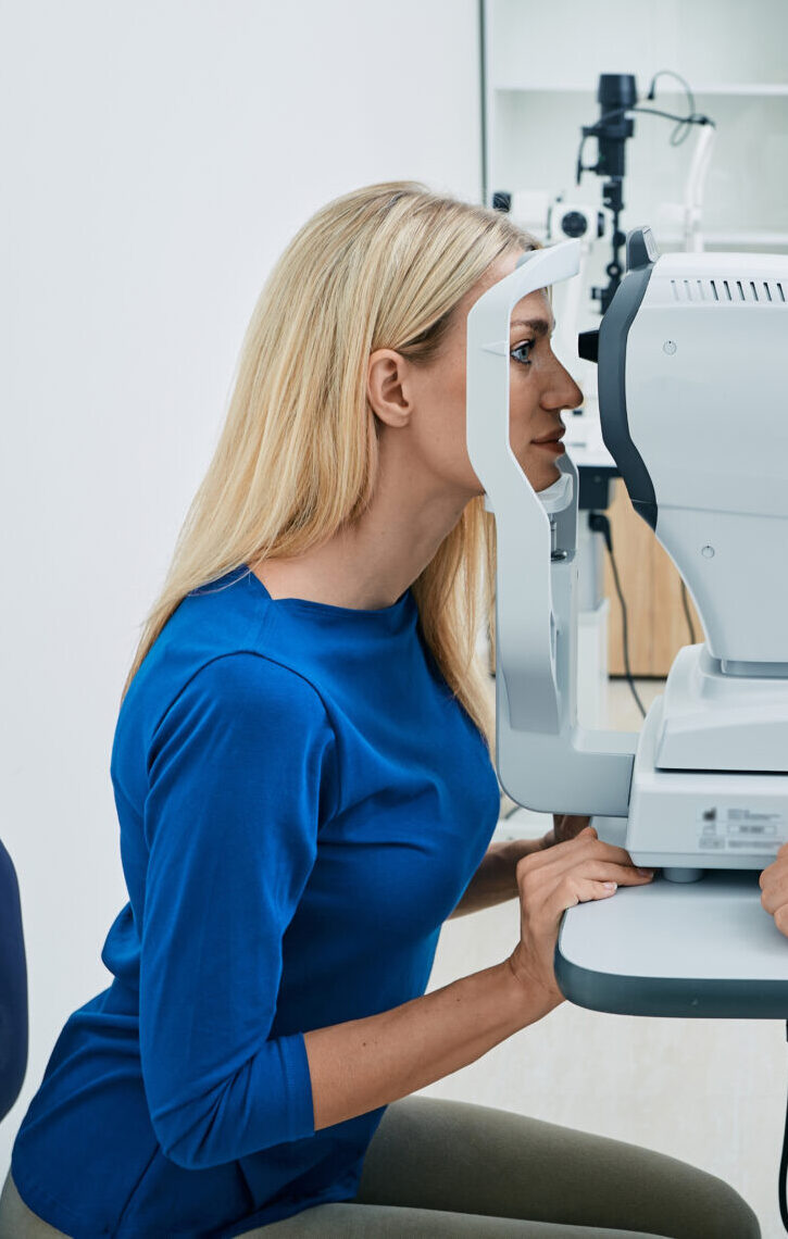 Patient recieving eye exam from local eye doctor