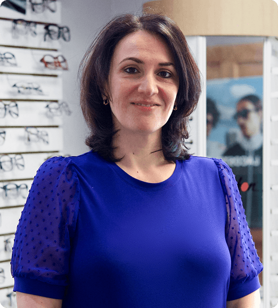 Patient smiling after her eye appointment with her local eye doctor