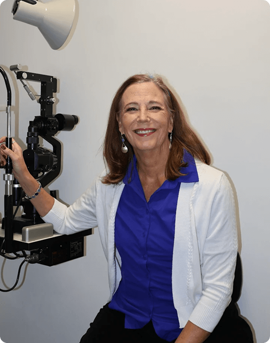 Patient smiling after her eye appointment with her local eye doctor
