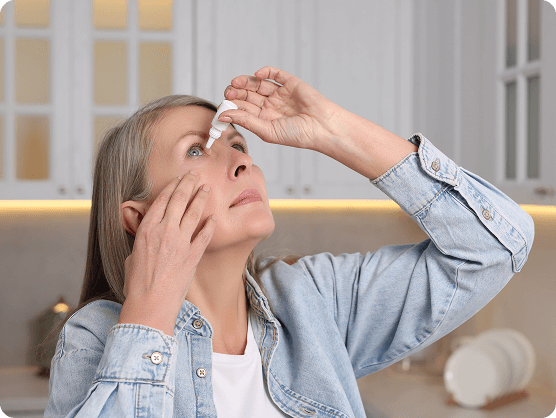 Patient smiling after her eye appointment with her local eye doctor