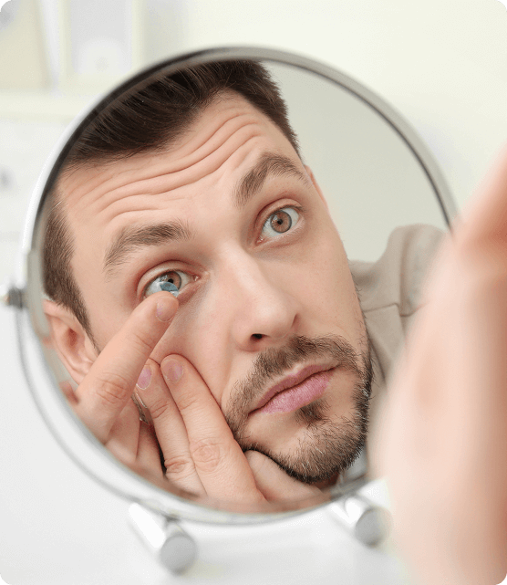 Patient smiling after her eye appointment with her local eye doctor