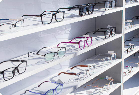 Patient smiling after her eye appointment with her local eye doctor