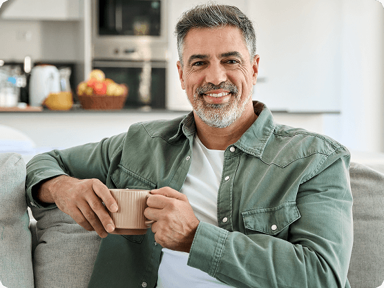 Patient smiling after her eye appointment with her local eye doctor
