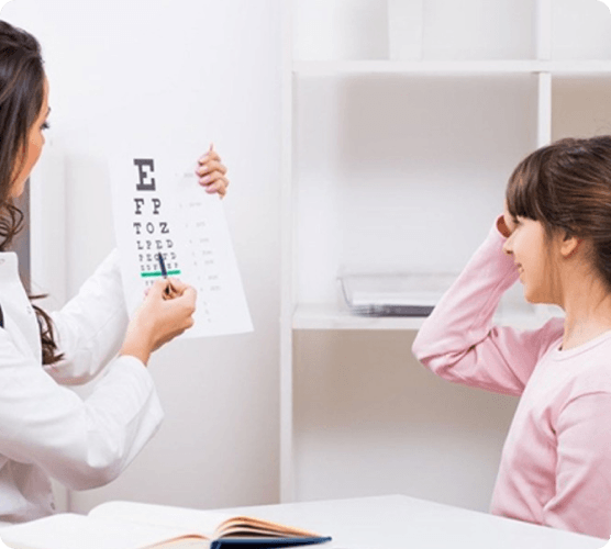 Patient smiling after her eye appointment with her local eye doctor